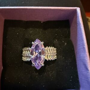 Lavish Silver Ring with Purple Gemstone